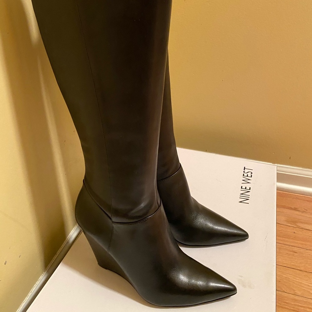 Black leather wedge heel boots